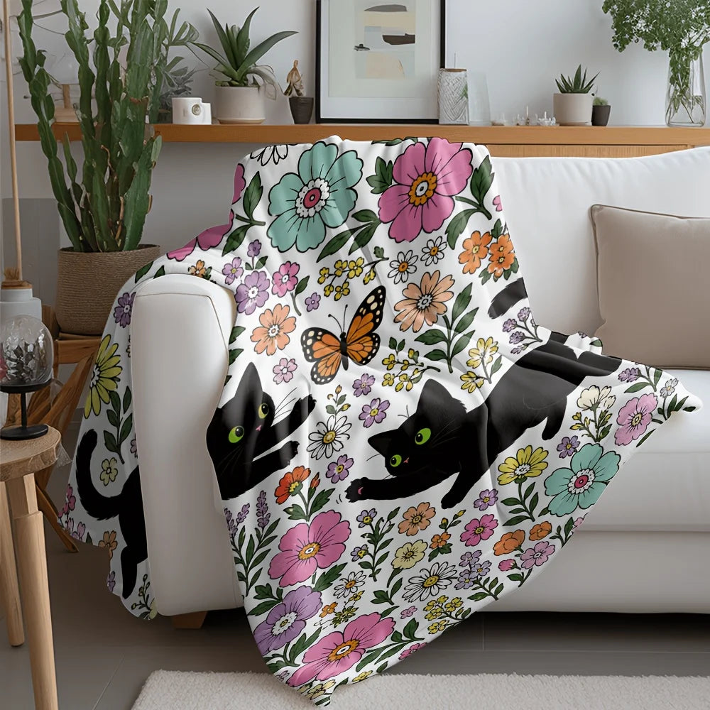Green-Eyed Black Cat & Print Blanket.